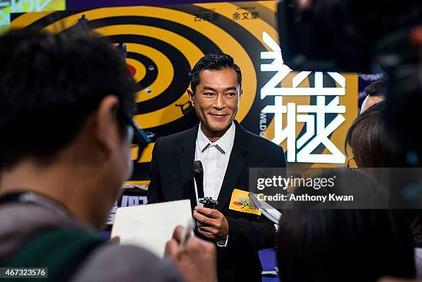 Louis Koo of Hong Kong speaks with the media at Wild City Press Conference during the 39th Hong Kong International Film Festival at Hong Kong...