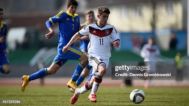 Mats Koehlert of Germany vies for the ball during the UEFA Under 17 Elite Round match between Germany and Ukraine at Georg-Gassmann-Stadion on March...