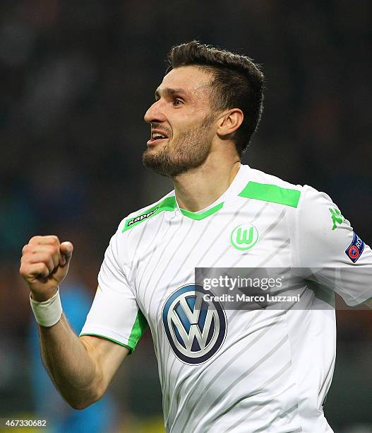 Daniel Caligiuri of VfL Wolfsburg celebrates after scoring the opening goal during the UEFA Europa League Round of 16 match between FC Internazionale...