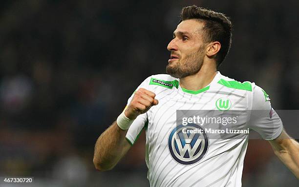 Daniel Caligiuri of VfL Wolfsburg celebrates after scoring the opening goal during the UEFA Europa League Round of 16 match between FC Internazionale...