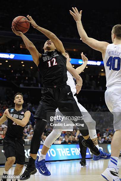 Trey Kell of the San Diego State Aztecs goes to the basket against the Duke Blue Devils during the third round of the 2015 NCAA Men's Basketball...