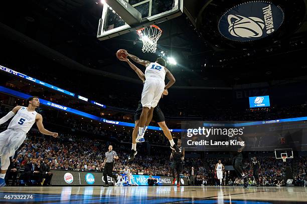 Justise Winslow of the Duke Blue Devils blocks a shot by J.J. O'Brien of the San Diego State Aztecs during the third round of the 2015 NCAA Men's...