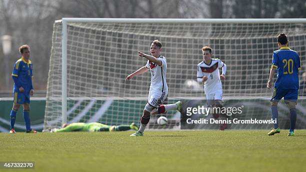 Niklas Schmidt of Germany celebrates as he scores the third goal during the UEFA Under 17 Elite Round match between Germany and Ukraine at...