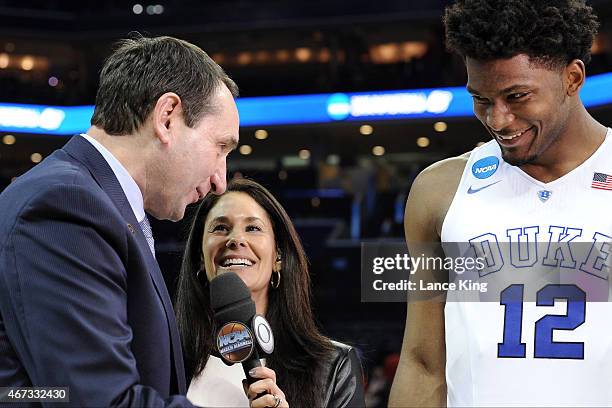 Sportscaster, Tracy Wolfson, interviews Head Coach Mike Krzyzewski and Justise Winslow of the Duke Blue Devils following a game against the San Diego...