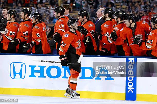 Kyle Palmieri of the Anaheim Ducks celebrates with his teammates after a goal in the third period against the Los Angeles Kings during the 2014 Coors...