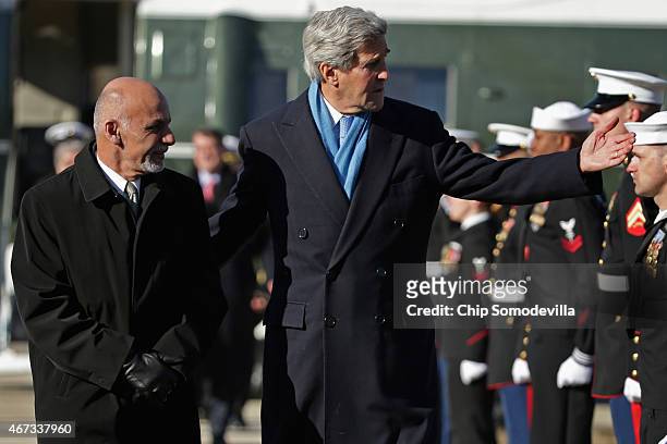 Secretary of State John Kerry and Afghanistan President Ashraf Ghani arrive at Camp David ahead of talks March 23, 2015 in Camp David, Maryland....