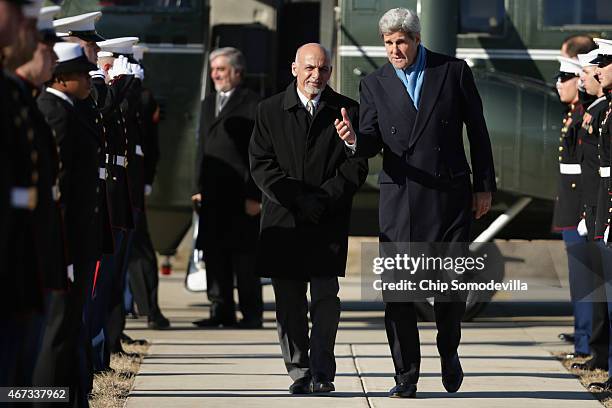 Secretary of State John Kerry and Afghanistan President Ashraf Ghani arrive at Camp David ahead of talks March 23, 2015 in Camp David, Maryland....