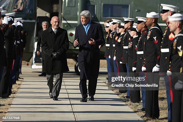 Secretary of State John Kerry and Afghanistan President Ashraf Ghani arrive at Camp David ahead of talks March 23, 2015 in Camp David, Maryland....