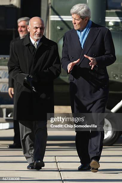 Secretary of State John Kerry and Afghanistan President Ashraf Ghani arrive at Camp David ahead of talks March 23, 2015 in Camp David, Maryland....