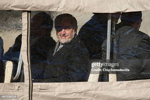 Afghanistan Chief Executive Abdullah Abdullah sits inside a covered golf cart after he and Afghanistan President Ashraf Ghani arrived at Camp David...