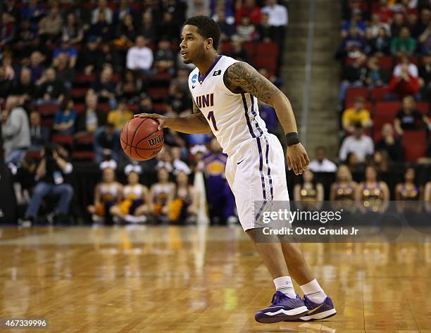 Deon Mitchell of the UNI Panthers dribbles against the Wyoming Cowboys during the second round of the 2015 Men's NCAA Basketball Tournament at Key...