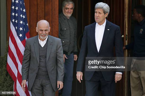 Afghanistan President Ashraf Ghani, Afghanistan Chief Executive Abdullah Abdullah and U.S. Secretary of State John Kerry walk out to make brief...