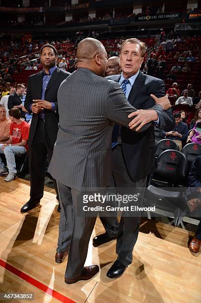 Melvin Hunt of the Denver Nuggets hugs former Houston Rockets coach, Rudy Tomjanovich before the Denver Nuggets game against the Houston Rockets on...