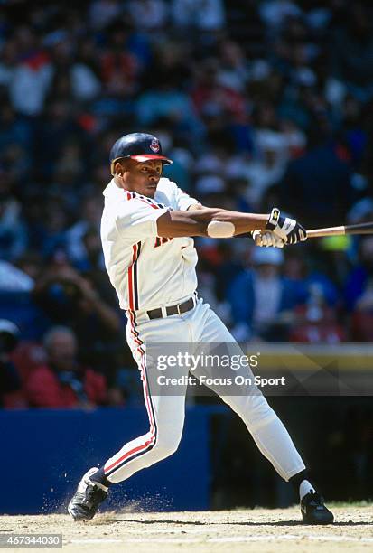 Albert Belle of the Cleveland Indians bats during an Major League Baseball game circa 1993 at Cleveland Stadium in Cleveland, Ohio. Belle played for...