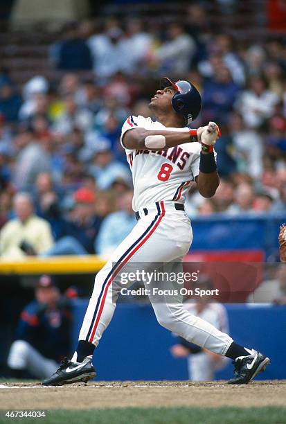 Albert Belle of the Cleveland Indians bats during an Major League Baseball game circa 1993 at Cleveland Stadium in Cleveland, Ohio. Belle played for...