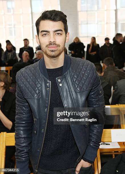 Recording artist Joe Jonas attends the Duckie Brown show during Mercedes-Benz Fashion Week Fall 2014 at Industria Superstudio on February 6, 2014 in...