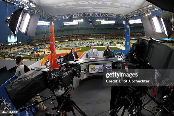 Hradek, Barry Melrose and Ron Wilson broadcast from Dodger Stadium during team practice before the 2014 Coors Light NHL Stadium Series between the...