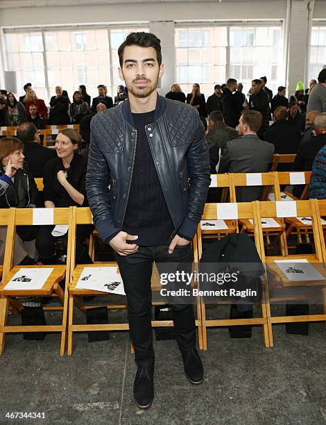 Recording artist Joe Jonas attends the Duckie Brown show during Mercedes-Benz Fashion Week Fall 2014 at Industria Superstudio on February 6, 2014 in...