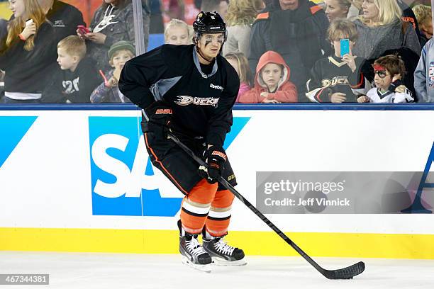 Luca Sbisa of the Anaheim Ducks with the puck during Team Practice in preparation for the 2014 Coors Light NHL Stadium Series at Dodger Stadium on...