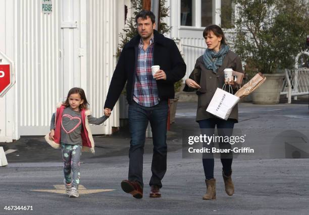 Ben Affleck and Jennifer Garner are seen leaving the Brentwood Country Mart with their daughter, Seraphina Affleck on February 06, 2014 in Los...