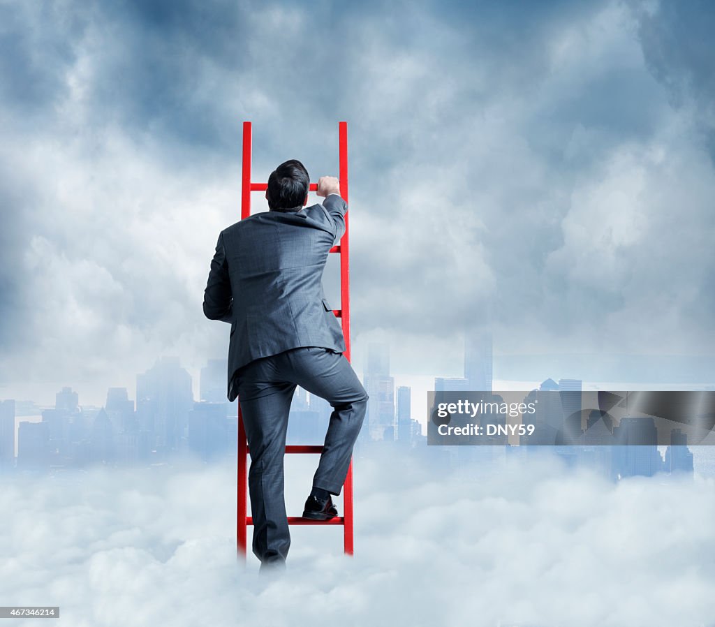 Businessman Climbing A Ladder For A Better Look