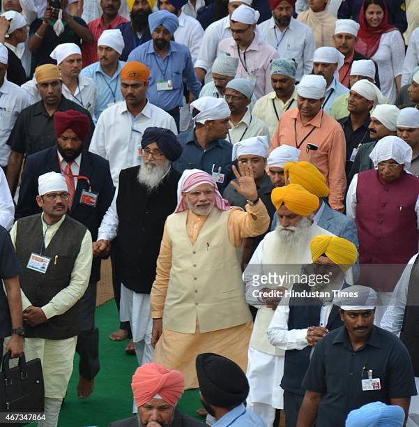 India Prime Minister Narendra Modi along with Punjab Chief Minister Parkash Singh Badal and BJP State President Kamal Sharma during his visit to pay...