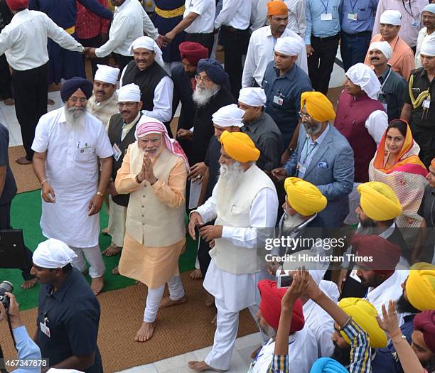 India Prime Minister Narendra Modi along with Punjab Chief Minister Parkash Singh Badal and BJP State President Kamal Sharma during his visit to pay...