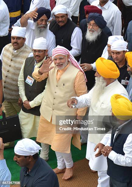 India Prime Minister Narendra Modi along with Punjab Chief Minister Parkash Singh Badal and BJP State President Kamal Sharma during his visit to pay...