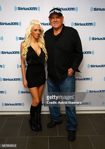 Personality Krissy Summers and owner of Moonlite BunnyRanch, Dennis Hof visit the SiriusXM Studios on March 23, 2015 in New York City.