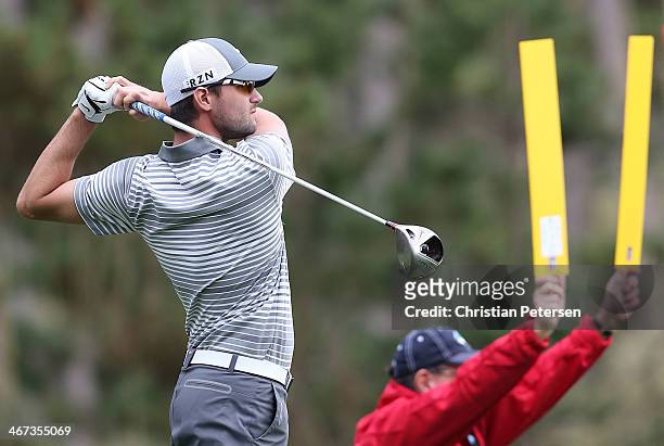 Kyle Stanley hits a tee shot on the ninth hole during the first round of the AT&T Pebble Beach National Pro-Am at Spyglass Hill Golf Course on...