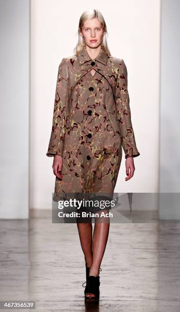 Model walks the runway at the Costello Tagliapietra fashion show during MADE Fashion Week Fall 2014 at Milk Studios on February 6, 2014 in New York...