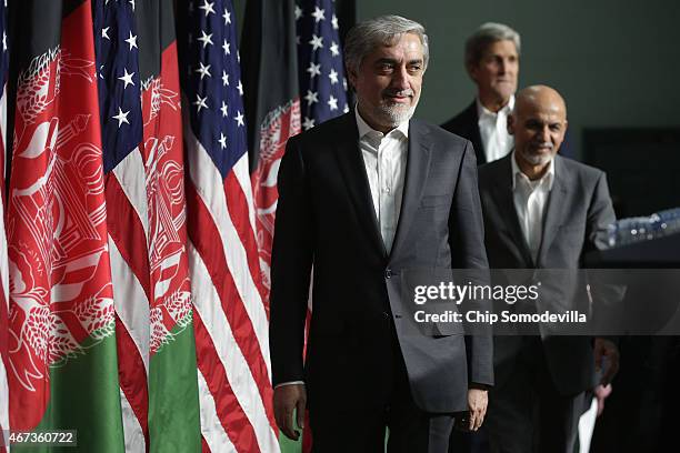 Afghanistan Chief Executive Abdullah Abdullah, Afghanistan President Ashraf Ghani and U.S. Secretary of State John Kerry take the stage for a news...