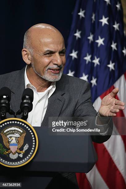 Afghanistan President Ashraf Ghani answers reporters' questions during a news conference after a day of U.S.-Afghan talks at Camp David March 23,...