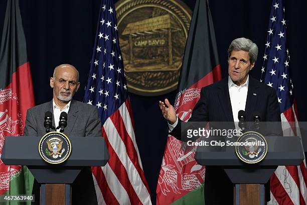 Afghanistan President Ashraf Ghani and U.S. Secretary of State John Kerry hold a news conference after a day of talks at Camp David March 23, 2015 in...