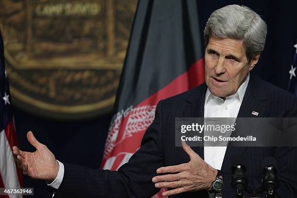 Secretary of State John Kerry answers reporters' questions during a news conference after a day of U.S.-Afghan talks at Camp David March 23, 2015 in...