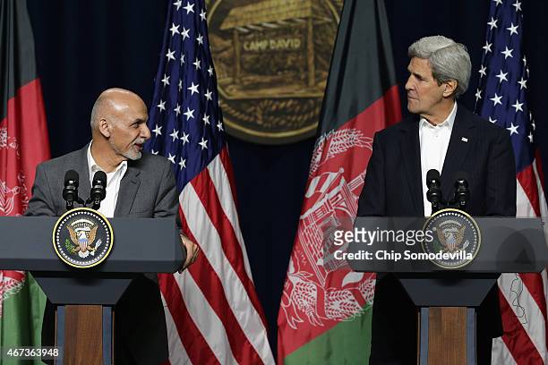 Afghanistan President Ashraf Ghani and U.S. Secretary of State John Kerry hold a news conference after a day of talks at Camp David March 23, 2015 in...