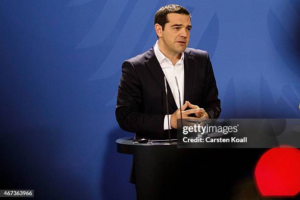 Greek Prime Minister Alexis Tsipras attend a press conference together with German Chancellor Angela Merkel following talks at the Chancellery on...