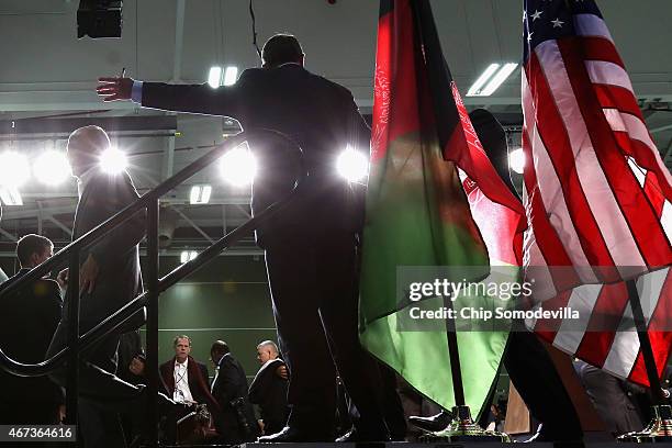 Afghanistan President Ashraf Ghani and U.S. Secretary of Defense Ashton Carter leave the stage after a news conference after a day of talks at Camp...