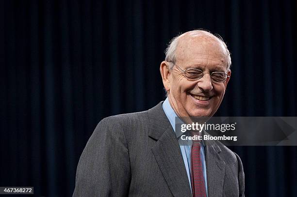 Supreme Court Justice Stephen Breyer smiles while waiting for the start of a Financial Services and General Government Subcommittee in Washington,...