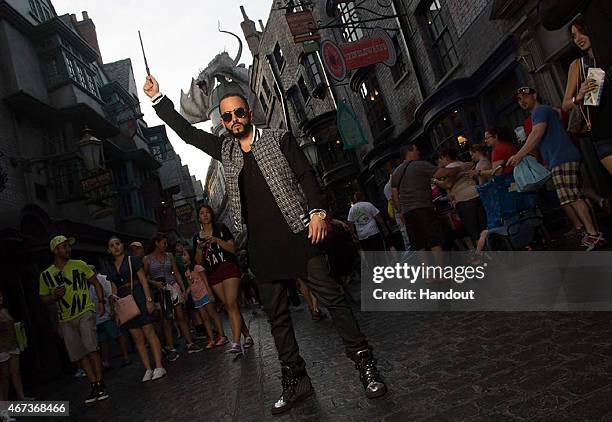In this handout photo provided by Universal Orlando Resort, reggaeton star, producer and composer Yandel, performs live at the Mardi Gras celebration...