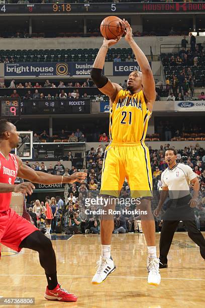 David West of the Indiana Pacers takes a shot against the Houston Rockets on March 23, 2015 at Bankers Life Fieldhouse in Indianapolis, Indiana. NOTE...