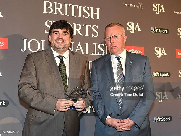 Martin Samuel of Daily Mail receives the Sports Columnist Award from Howard Wheatcroft during the SJA British Sports Journalism Awards at Grand...