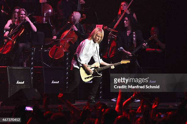 Rick Parfitt of Status Quo performs on stage during the Rock Meets Classic Concert at Wiener Stadthalle on March 23, 2015 in Vienna, Austria.