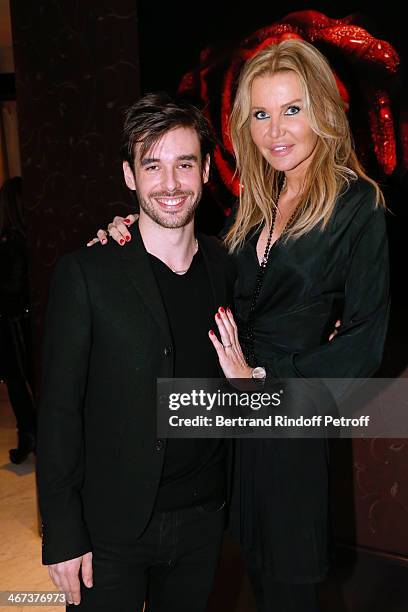 Arthur Aubert and Florentine Leconte attend the Arthur Aubert Exhibition private view. Held at Le Fouquet's Barriere Hotel on February 6, 2014 in...