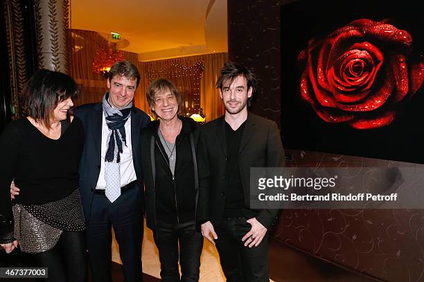 Philippe Perrot , Arthur Aubert with his father singer Jean-Louis Aubert and his mother France Aubert attend the Arthur Aubert Exhibition private...