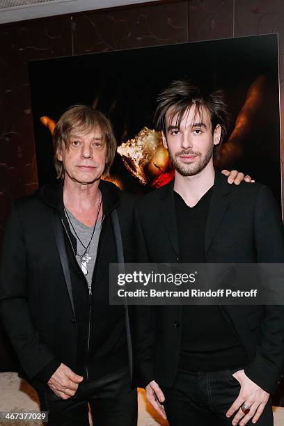 Singer Jean-Louis Aubert and his son Arthur Aubert attend the Arthur Aubert Exhibition private view. Held at Le Fouquet's Barriere Hotel on February...