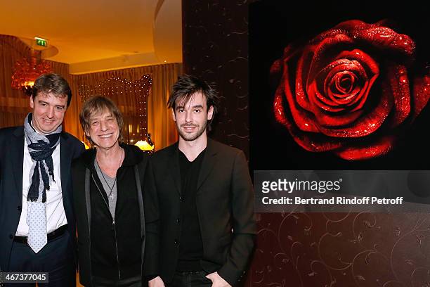 Philippe Perrot, Singer Jean-Louis Aubert and his son Arthur Aubert attend the Arthur Aubert Exhibition private view. Held at Le Fouquet's Barriere...