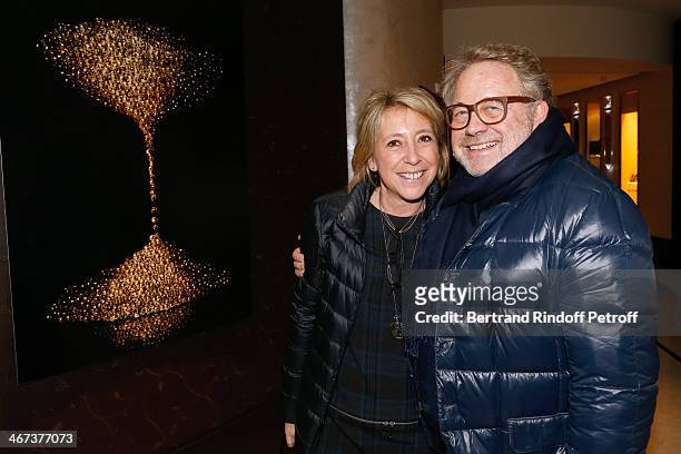 Manuela Isnard Seznec and Dominique Segall attend the Arthur Aubert Exhibition private view. Held at Le Fouquet's Barriere Hotel on February 6, 2014...