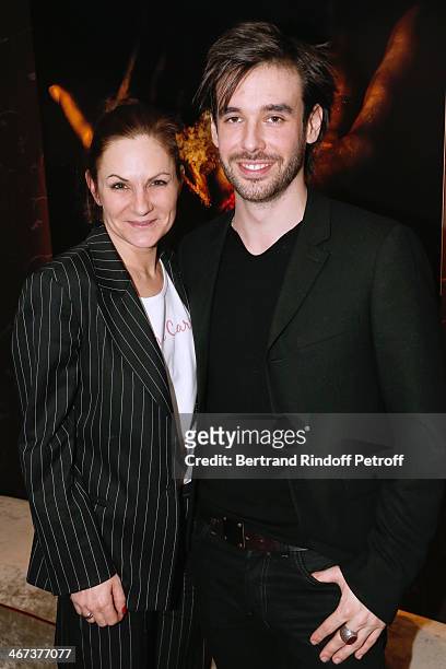 Anne Mondy and Arthur Aubert attend his Exhibition private view. Held at Le Fouquet's Barriere Hotel on February 6, 2014 in Paris, France.