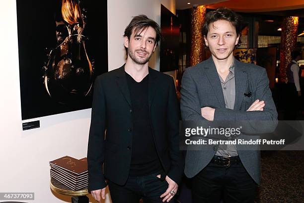 Arthur Aubert and singer Raphael attend the Arthur Aubert Exhibition private view. Held at Le Fouquet's Barriere Hotel on February 6, 2014 in Paris,...